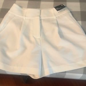 Express shortie super high rise dress shorts white size 00